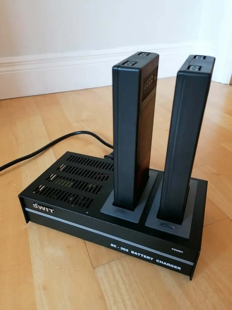 Swit Batteries and Charger - Image 1