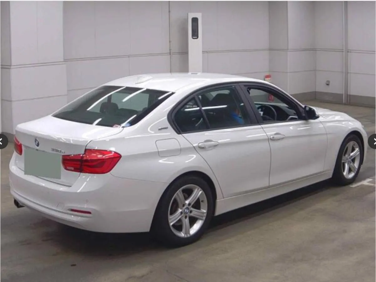 BMW 2002 BMW 330E 2016 in White with Low mileage . - Image 2