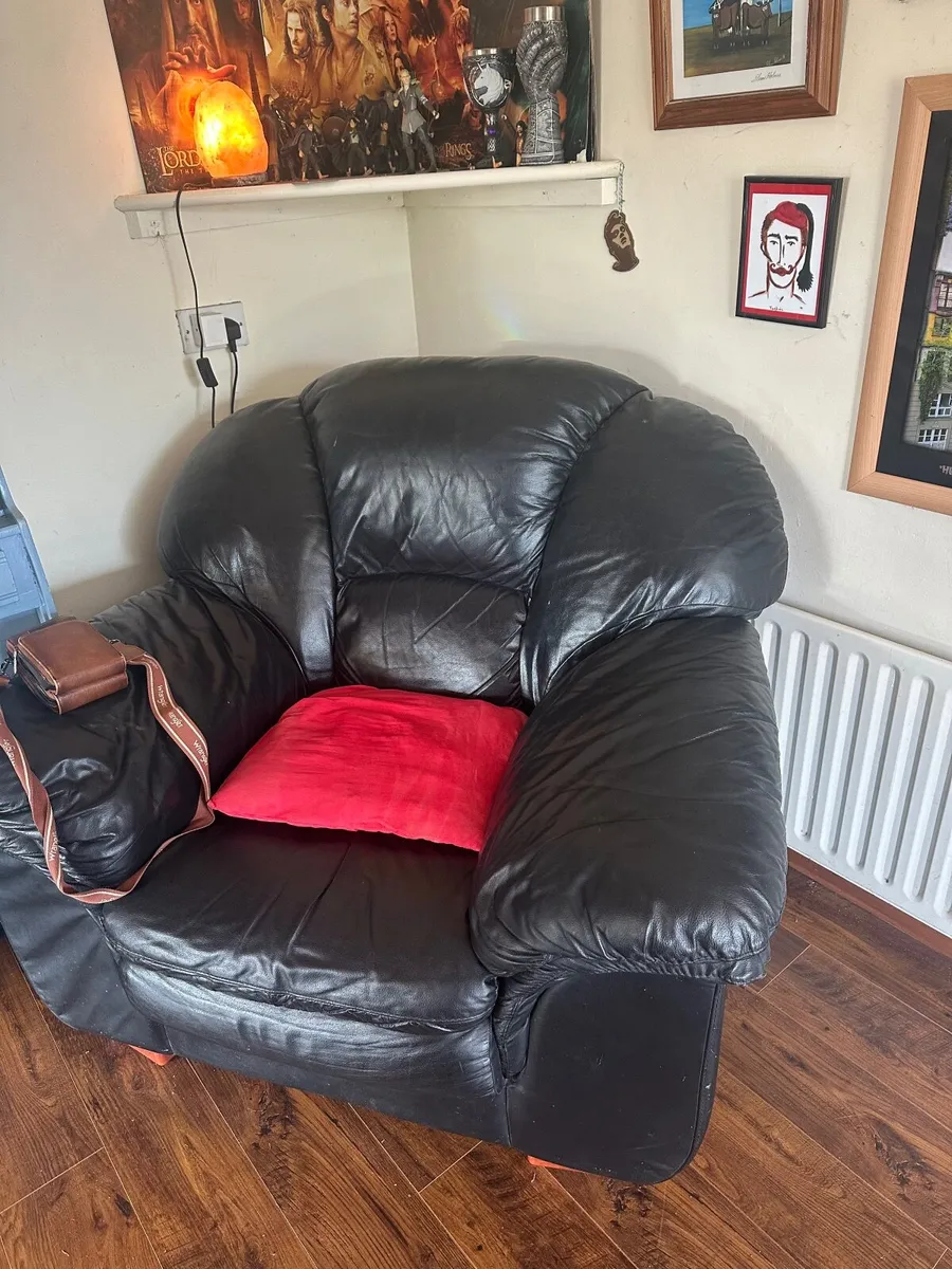 Two leather armchairs black good condition
