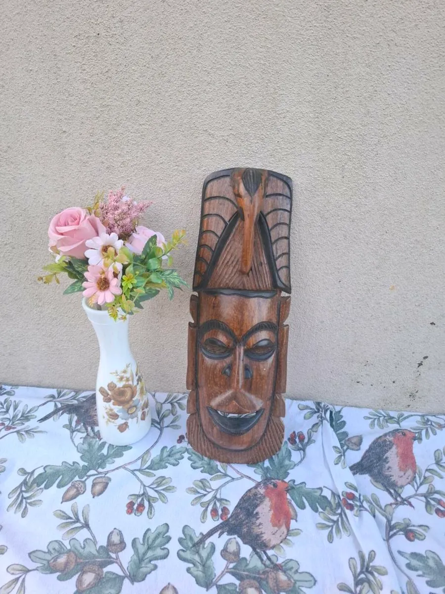 African wood mask postage possible