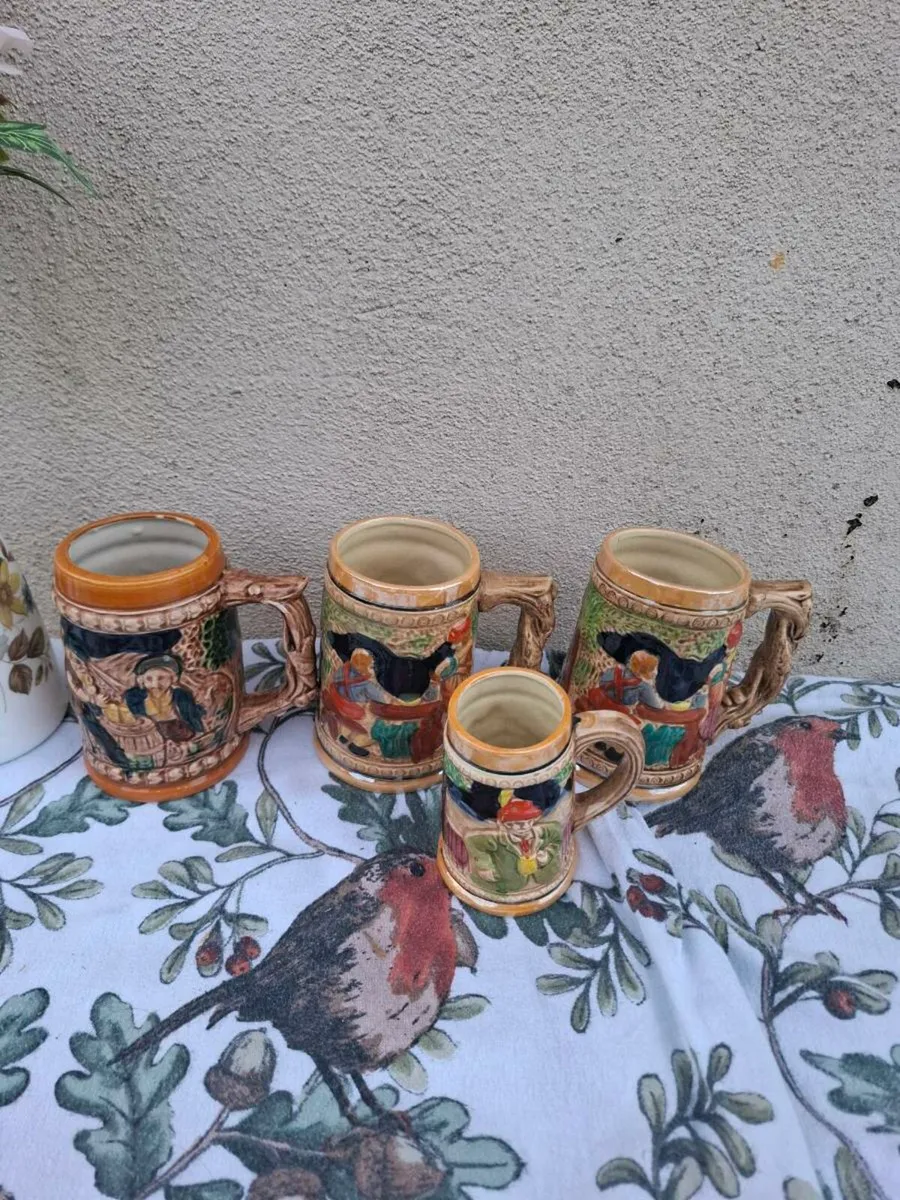 4 ceramic german beer mugs postage possible