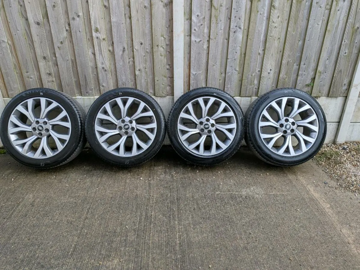 Lot 54 Genuine Land Rover 21” Alloy Wheels + Bridg - Image 1