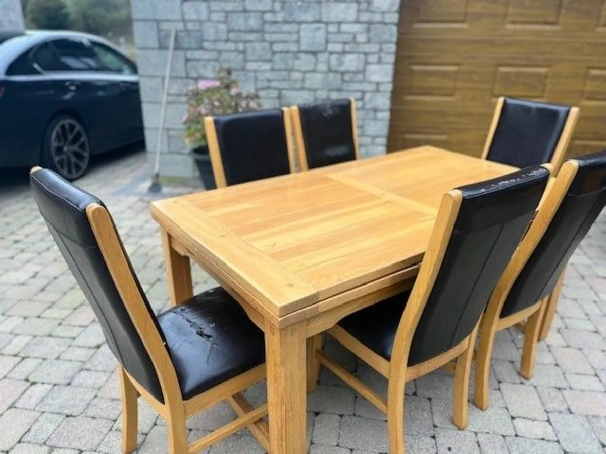 Dining Table and 8 Chairs - Image 1