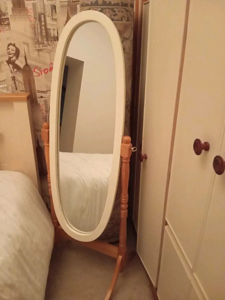 Mirror on stand .