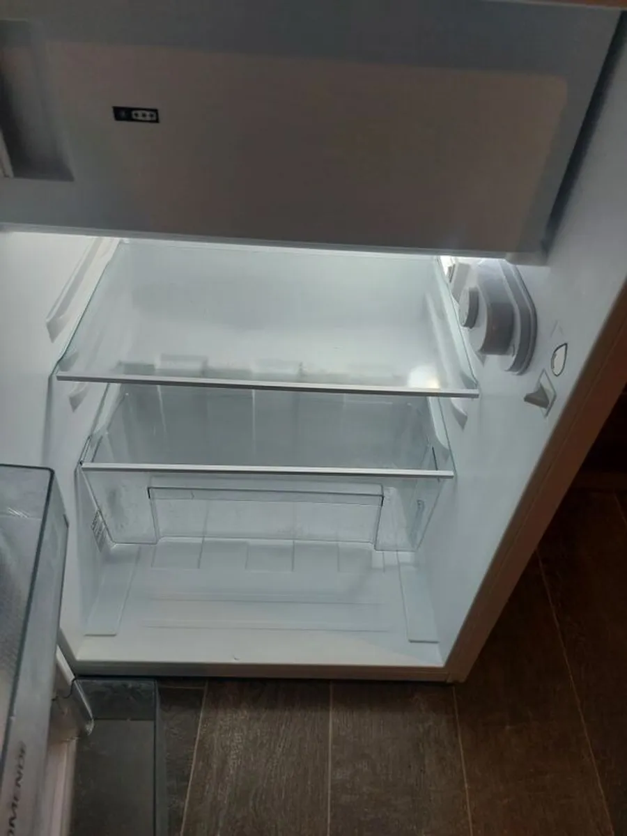 undercounter fridge freezer . And black microwave small - Image 2