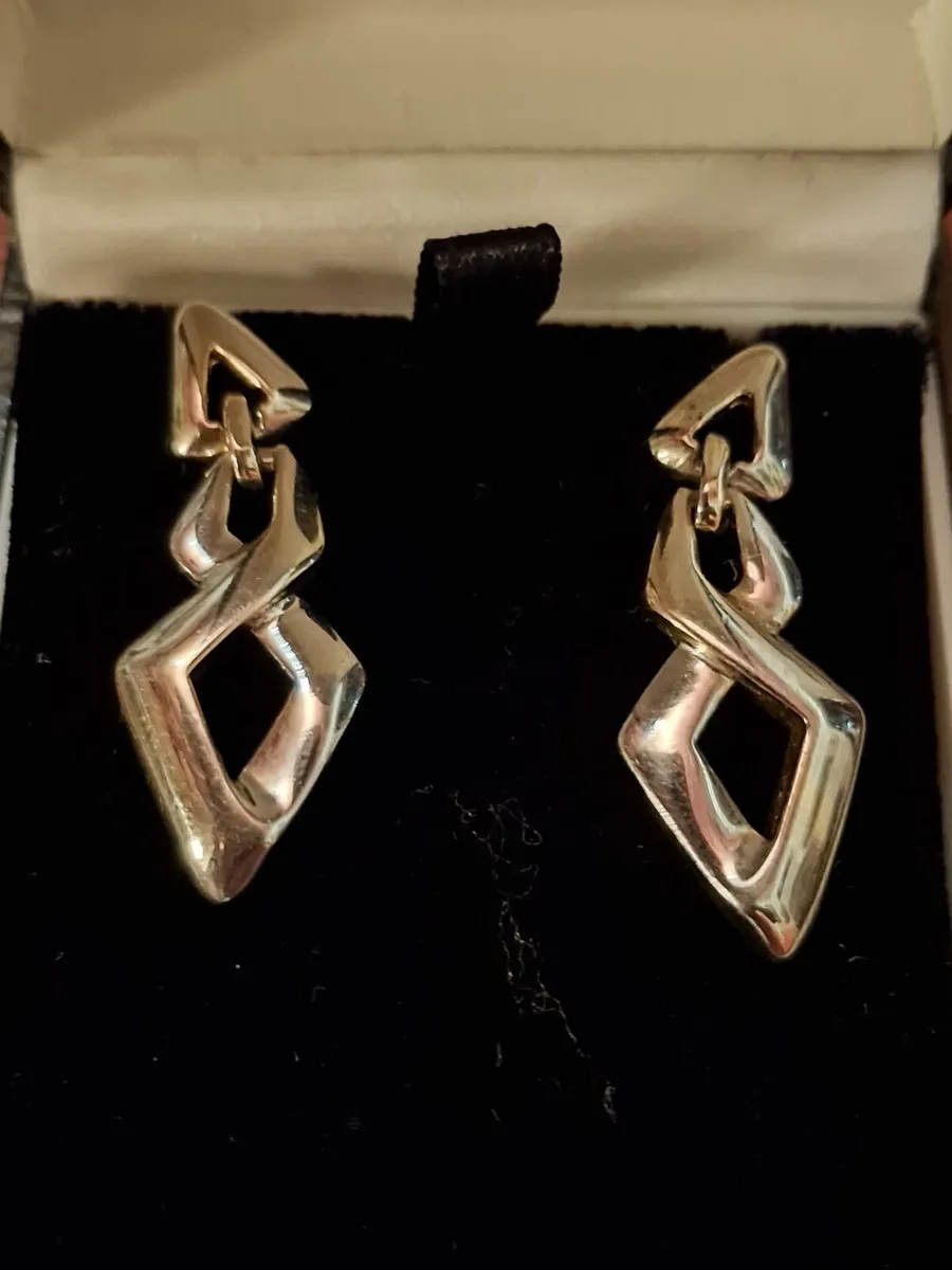 Silver tone earings. - Image 2
