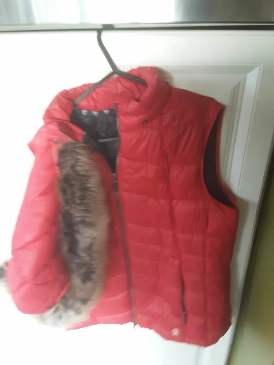 Ladies Barbour red sleeveless jacket with fur rimm - Image 1