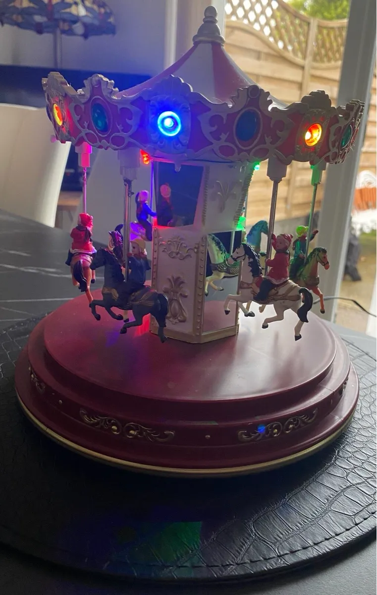 Christmas Musical Revolving Carousel - Image 1