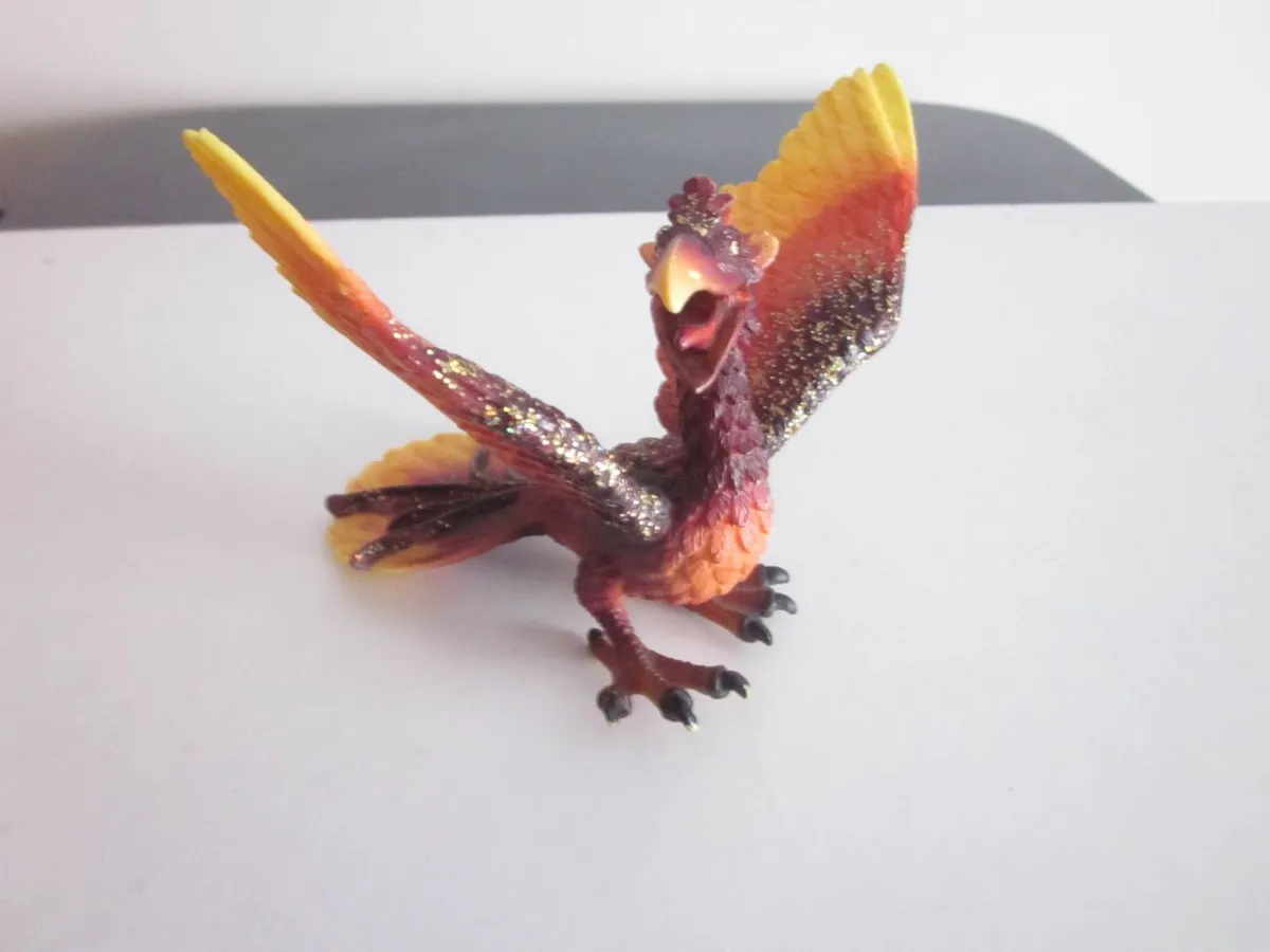 Schleich World of Knights Phoenix Red Yellow Bird - Image 1