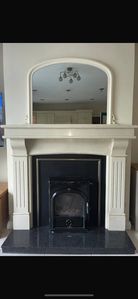 Stove with back boiler insert.