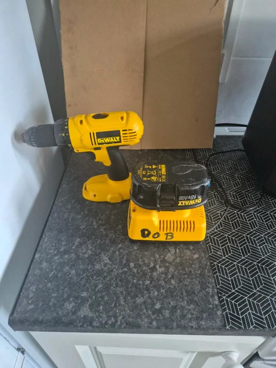 Dewalt drill and charger - Image 1