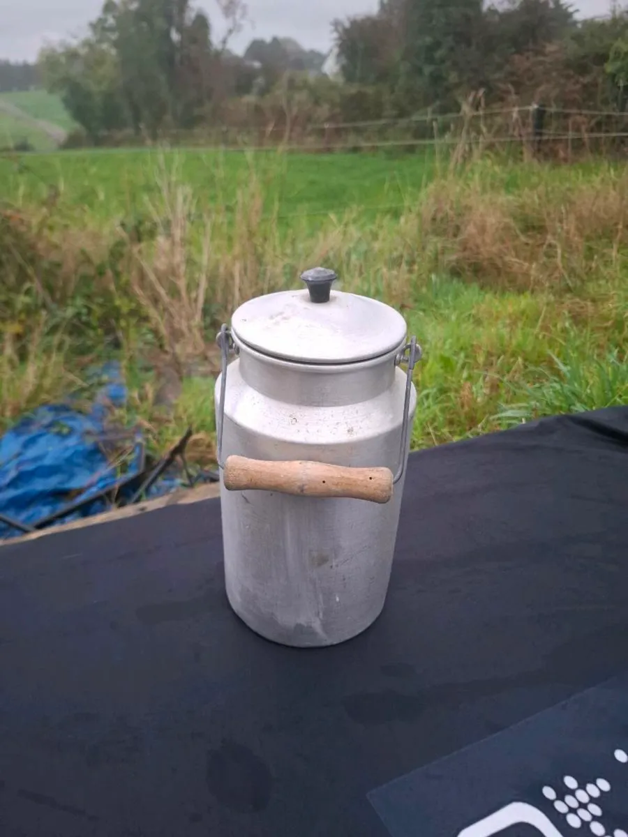 Small vintage milk can postage possible