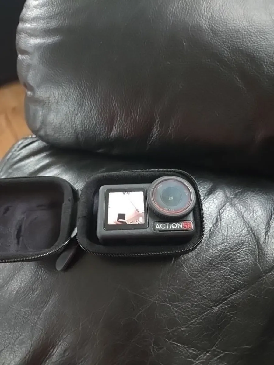 dji osmo action 5 pro with case and extras - Image 1