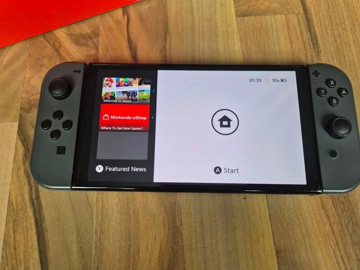 Nintendo Switch OLED with games and accessories - Image 2