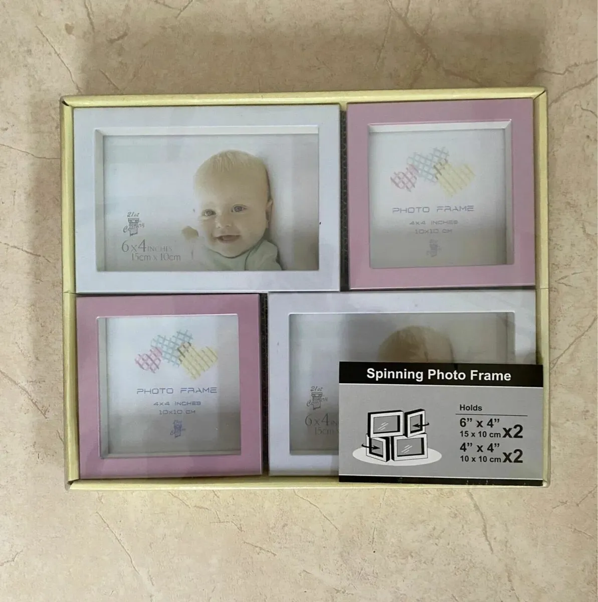 NEW SEALED Spinning Photo Frame - 4 pictures - Image 1