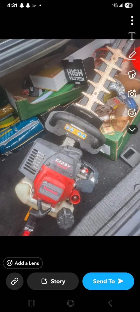 Petrol hedge trimmer