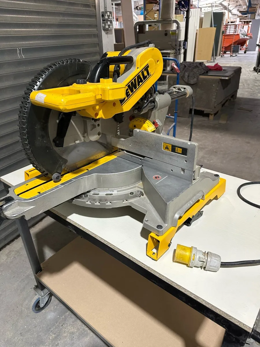 2 dewalt 12 inch chop saws (good condition) - Image 1