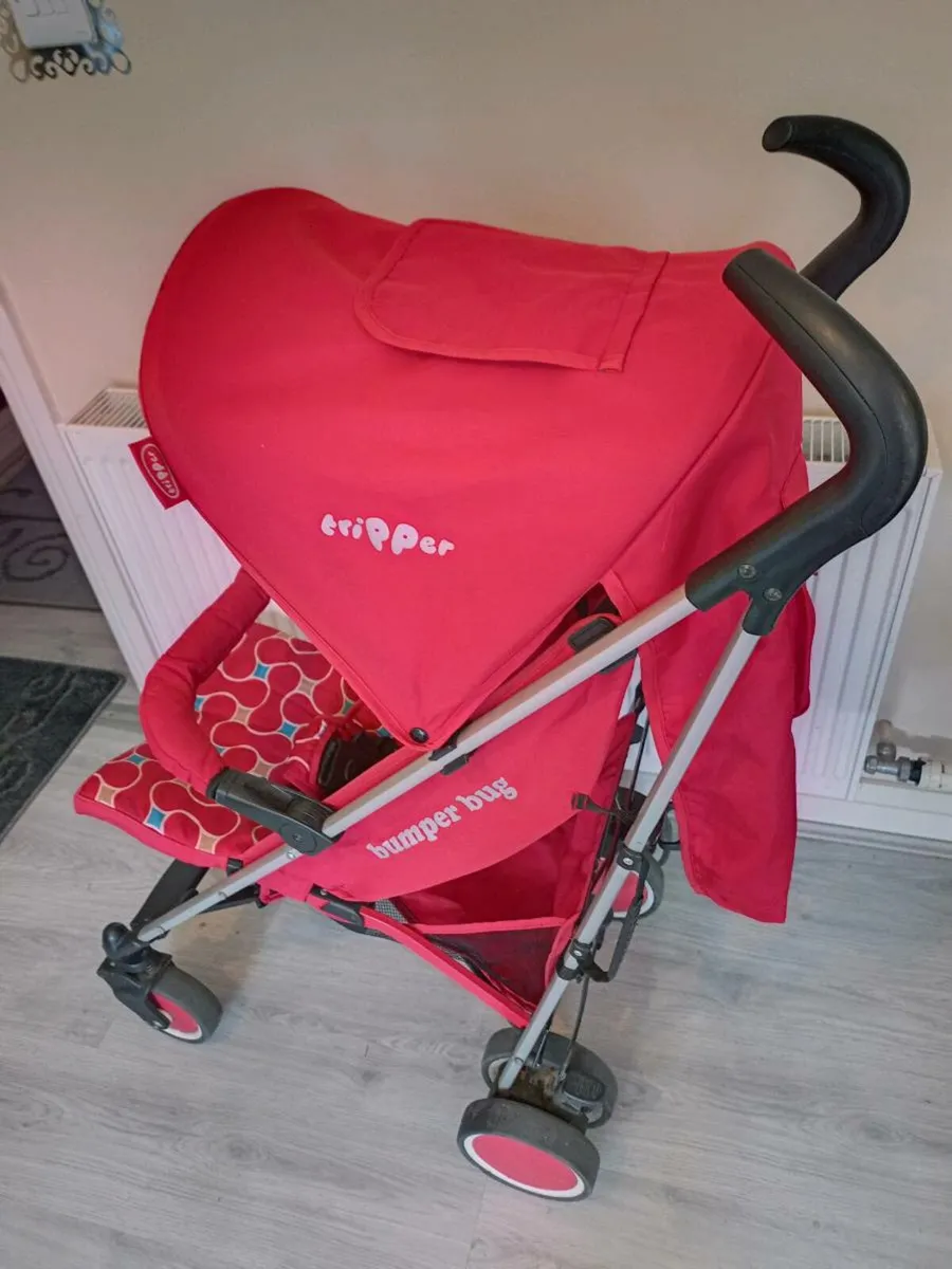 Tripper baby's buggy with rain cover - Image 1