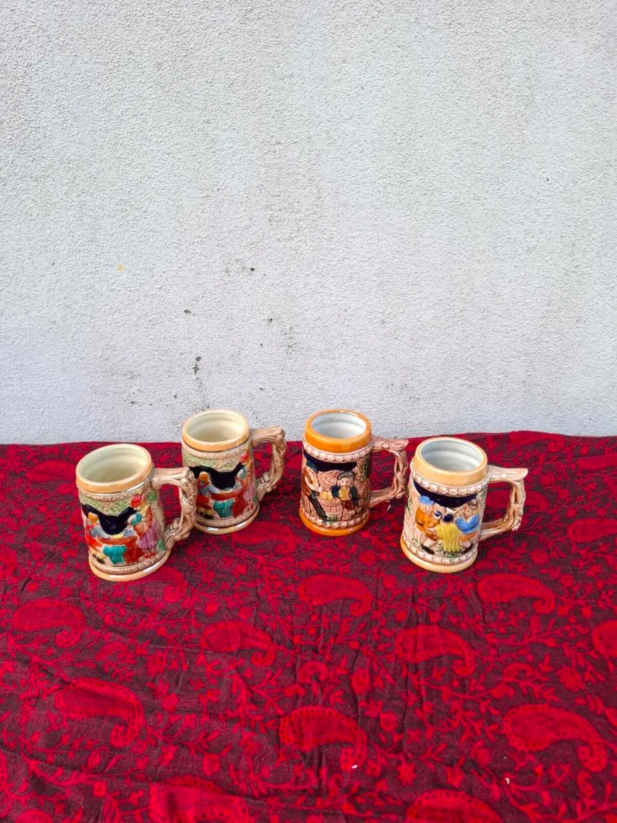 4 german beer mugs postage possible