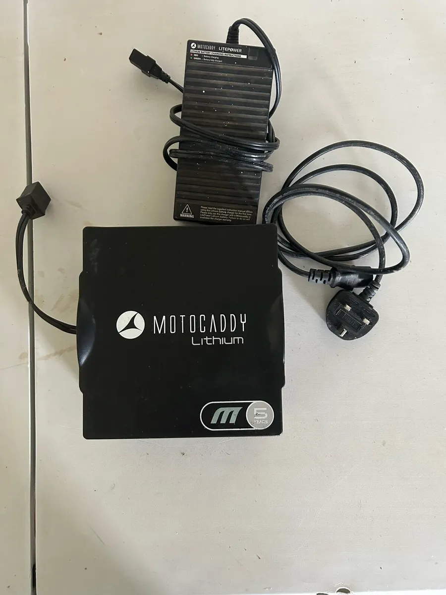 Motocaddy lithium 27 hole battery with charger - Image 1