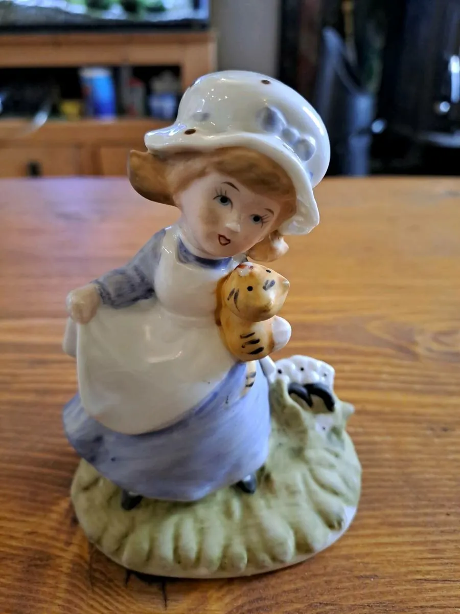Vintage porcelain figurine girl holding cat - Image 1
