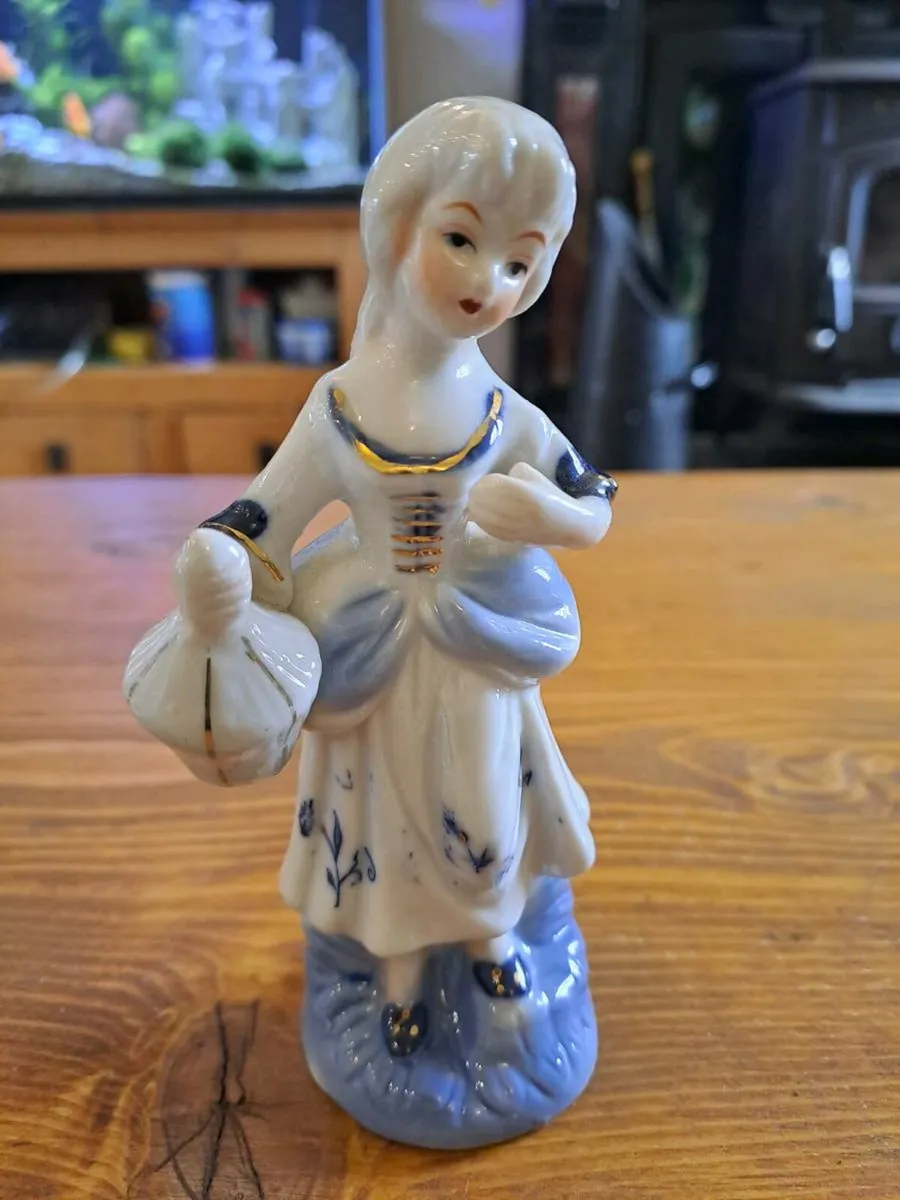 Vintage porcelain woman figurine - Image 1