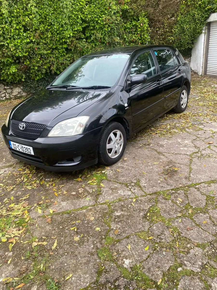 E12 Corolla - Image 1