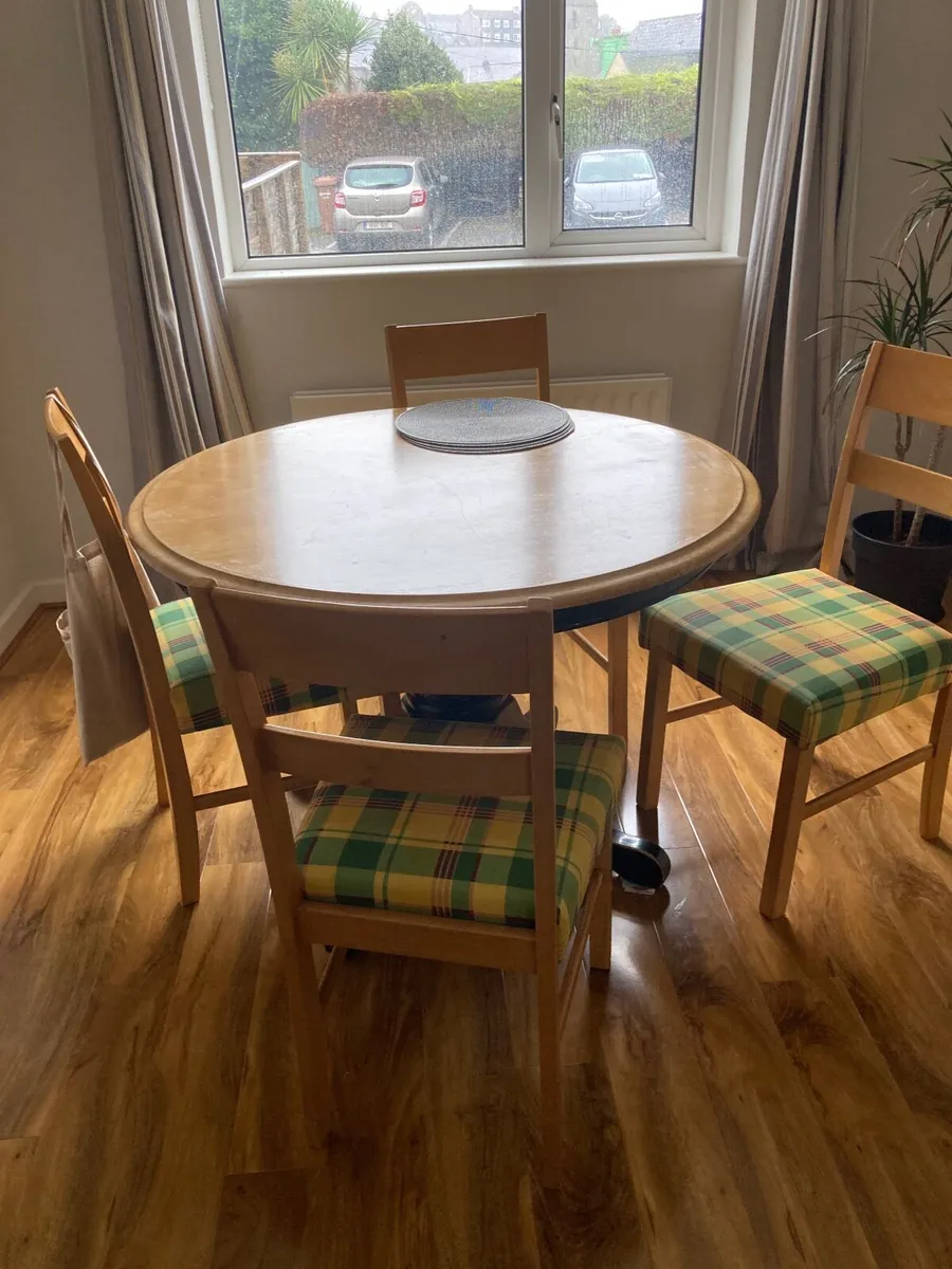 Round wooden table and 4 chairs