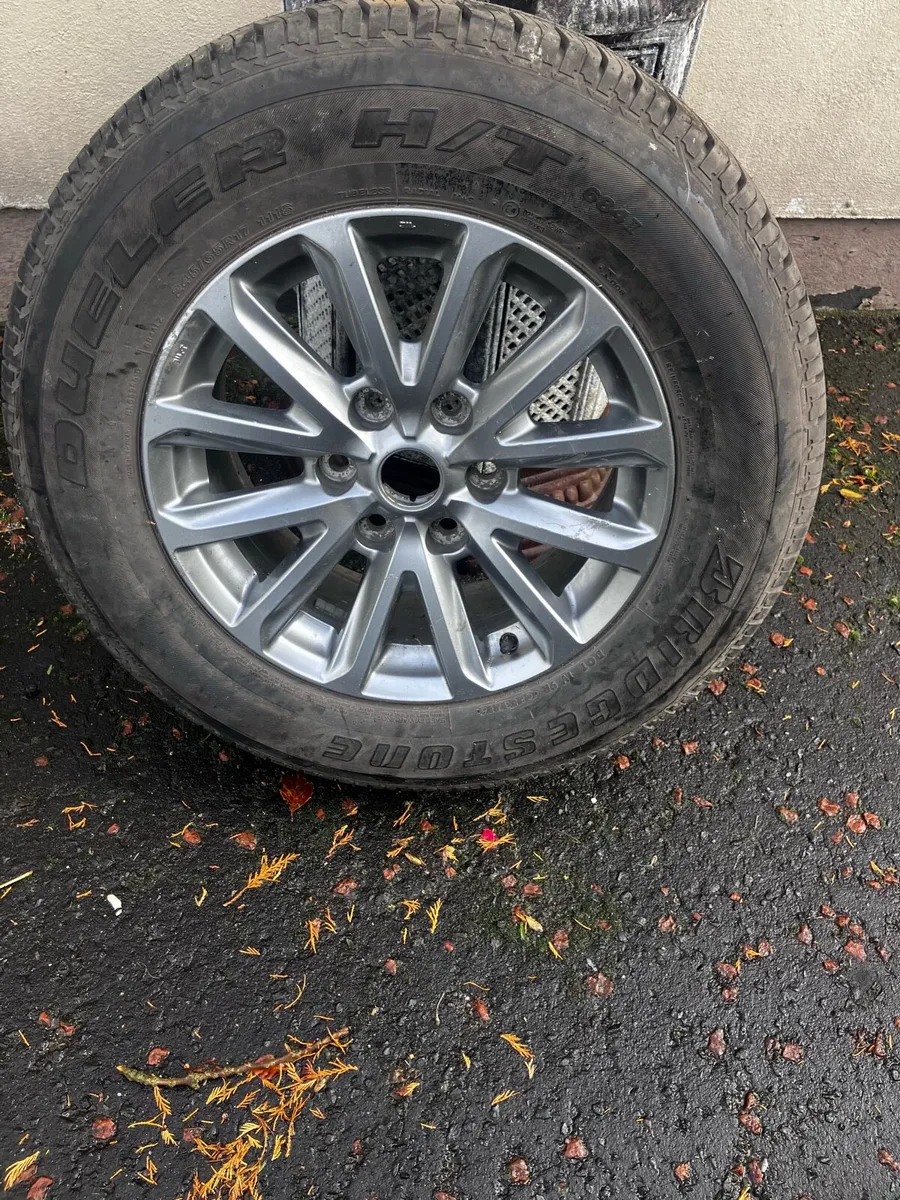 Unused Mitsubishi l200 alloy and Bridgestone tyre - Image 1