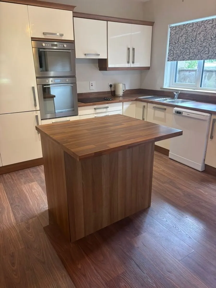 kitchen with island and appliances - Image 2