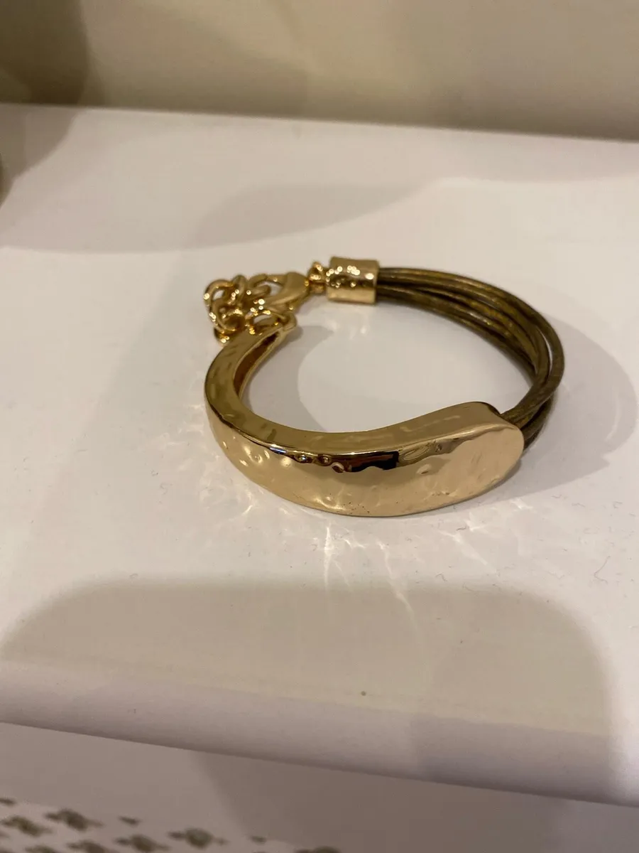 Gold tone braclet with leather strap Brand new - Image 1