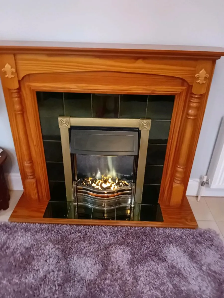 SOLID WOOD FIRE PLACE WITH ELECTRIC FIRE