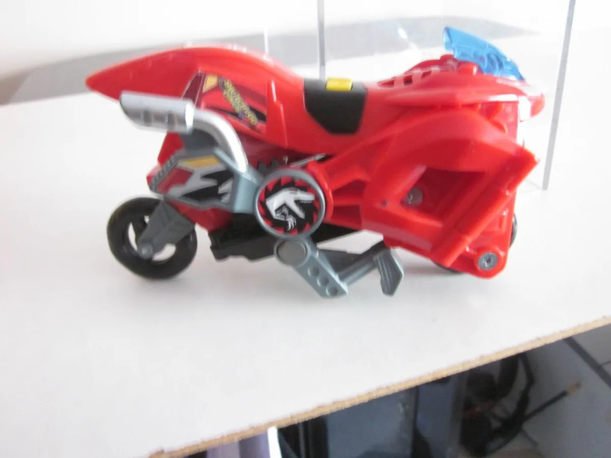 Vtech Switch & Go Dino Akuna MotorcycleTransformer - Image 1