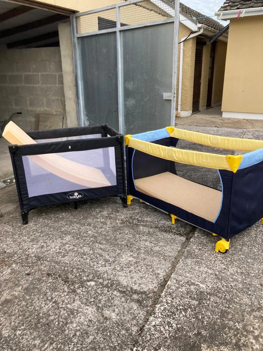 Travel cot x 2