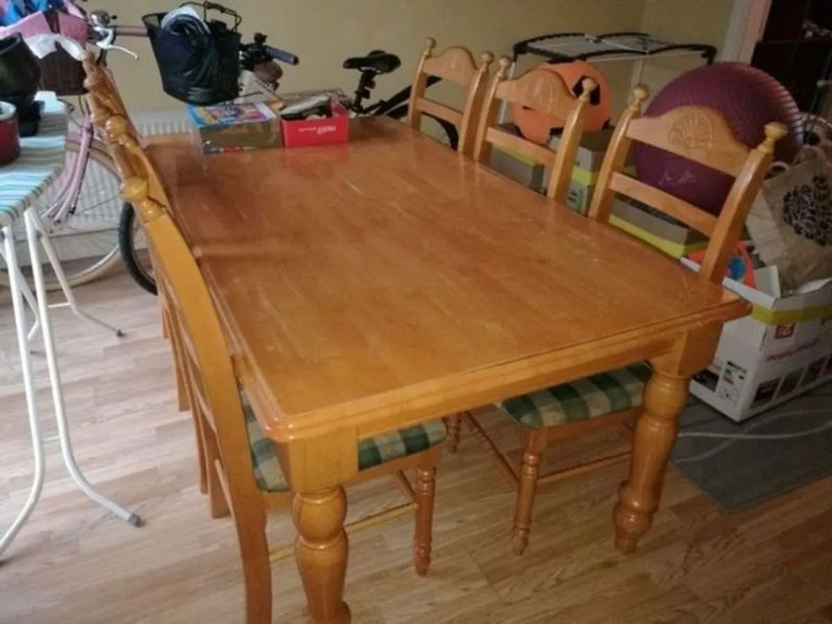 Solid wood Dining table with Chairs. Must Go!