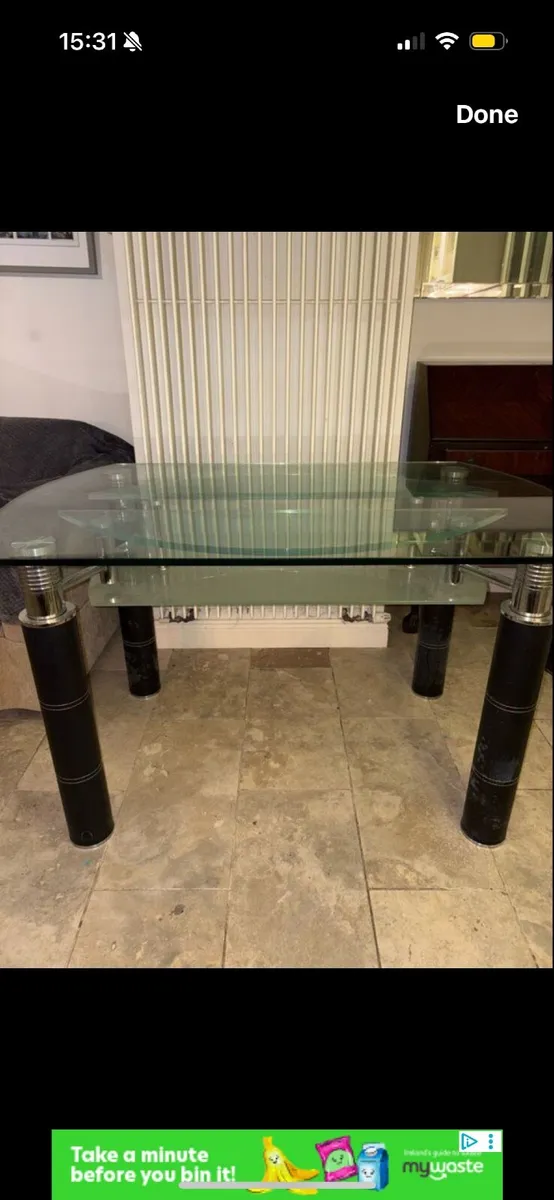 Glass table with black leather legs - Image 1