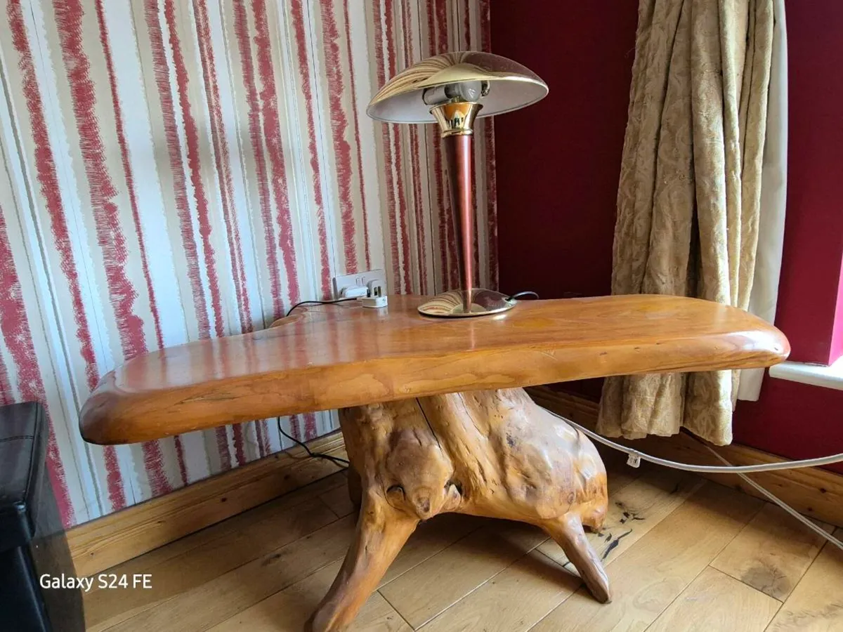 Swivel chair and coffee table. - Image 1