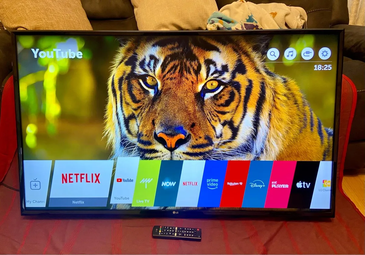 LG 50” 4K Smart Tv & Wall Bracket - Image 1