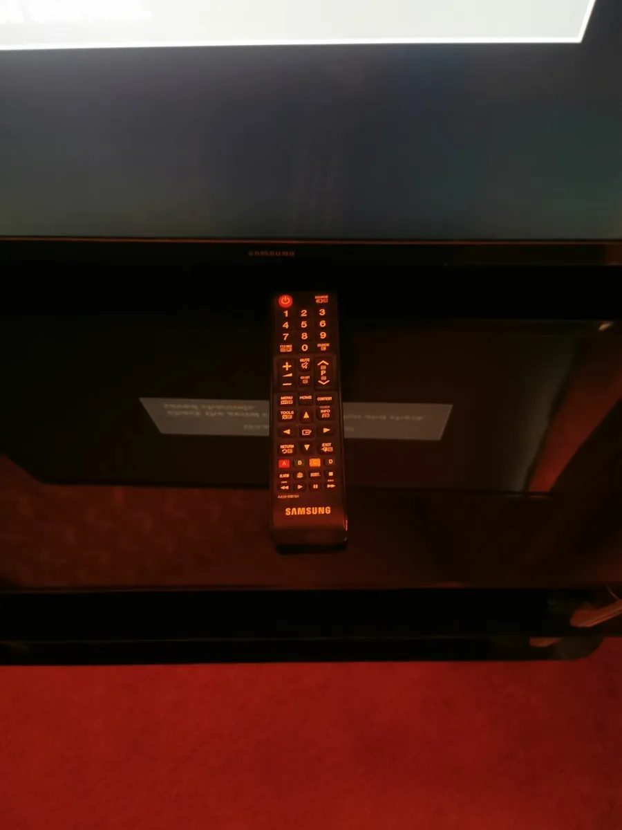 Television and Glass Table - Image 2
