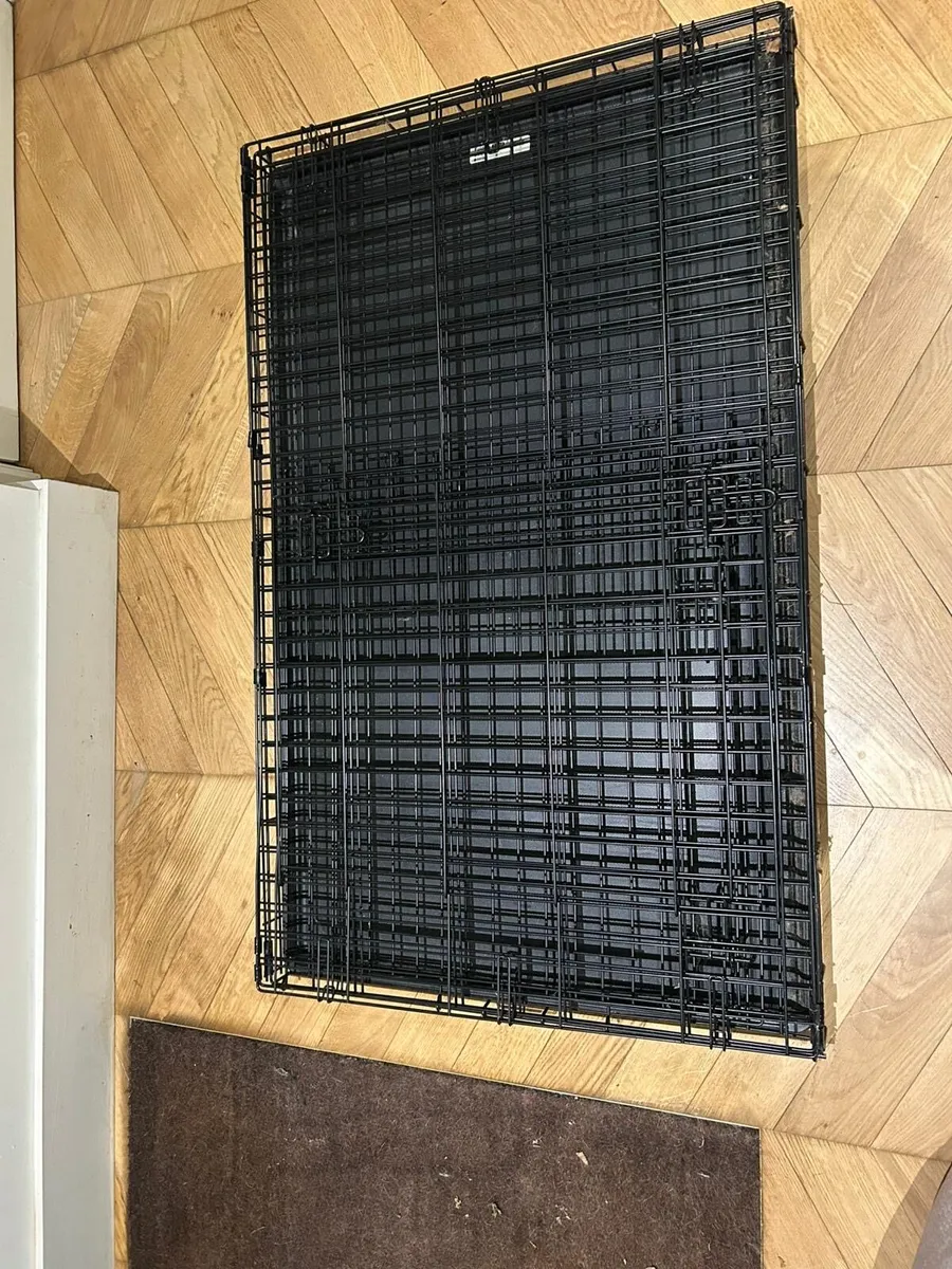 A dog cage - Image 1