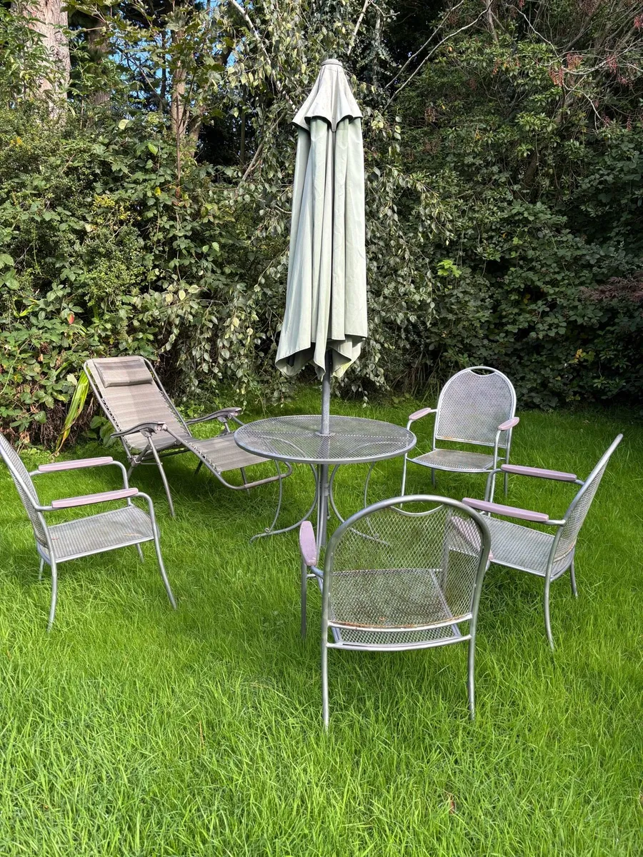 Garden table, chairs, umbrella and lounger