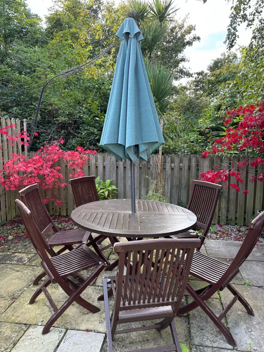 Garden table, chairs and umbrella