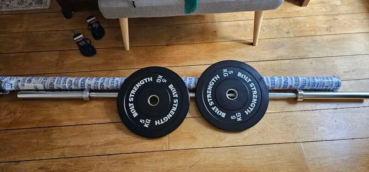 Olympic bar: 7ft Olympic bar (20kg) + two 5kg plates. . - Image 1