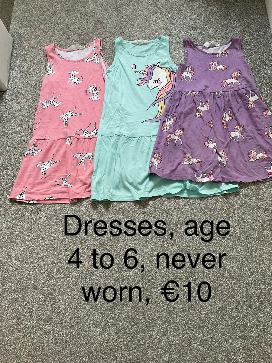 Girls dresses, age 4 to 6, never worn