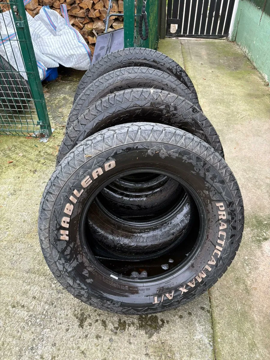Four 265/65/17 All Terrain Tires and used Bullbar - Image 1
