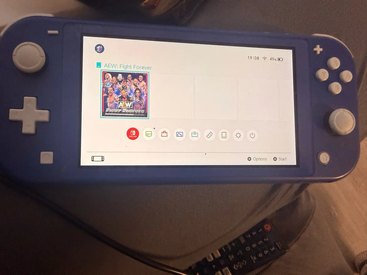 Nintendo Switch Lite Blue Console 32GB and - Image 4