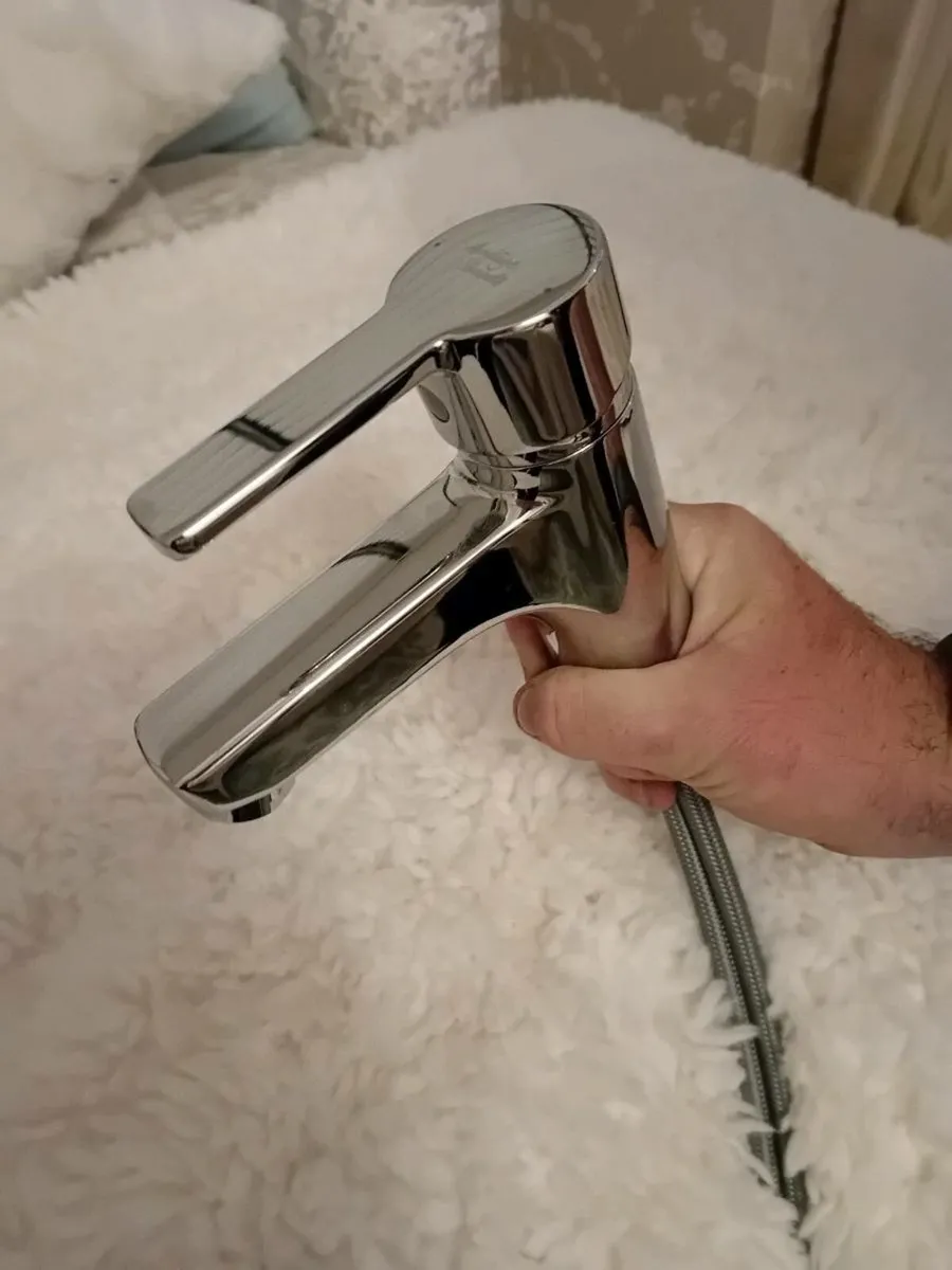 Tap and heated towel radiator - Image 1