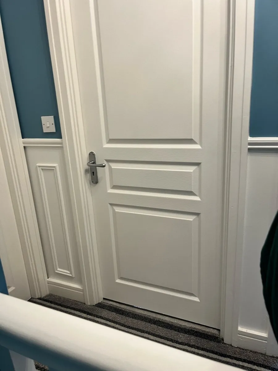 White interior doors with handles and hinges - Image 2