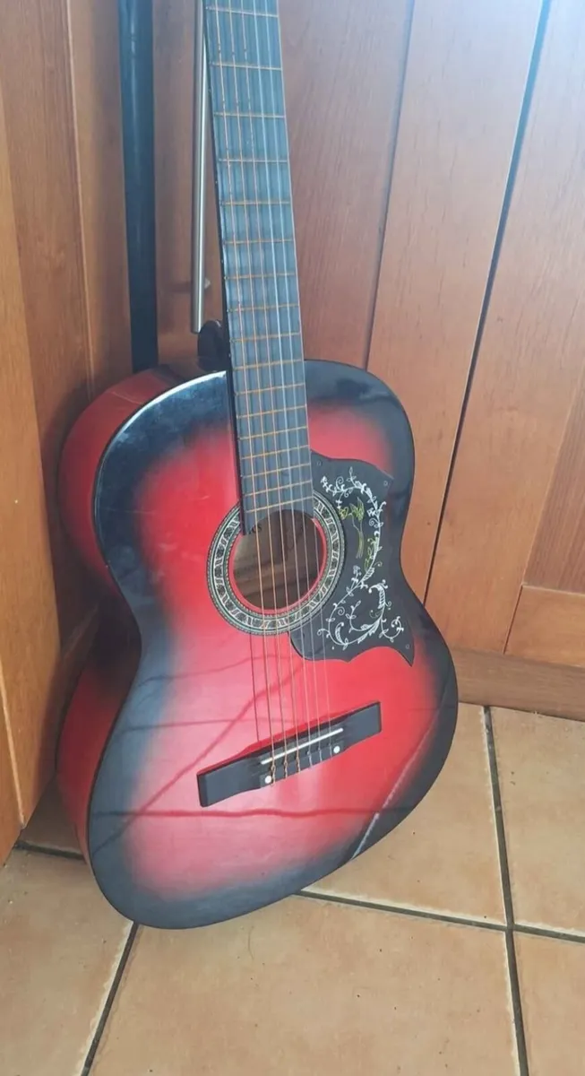 Red classical guitar with floral decor - Image 4