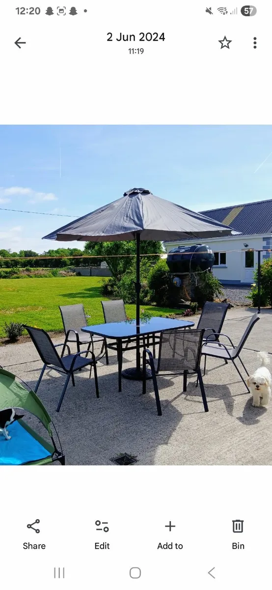 Garden table, chairs and umbrella